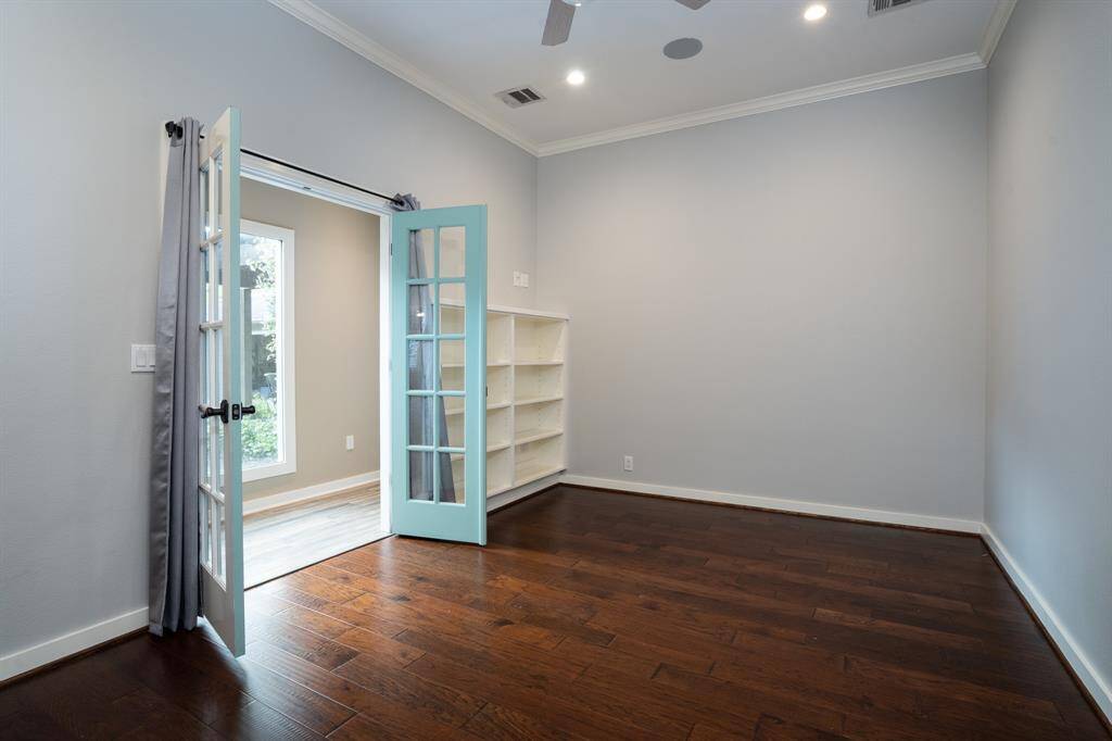 Flexible as a study or a fourth bedroom this space offers wood floors.