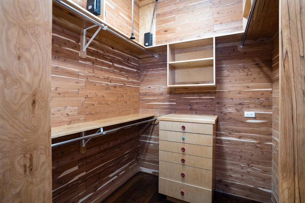 Closet is fully cedar lined for your fine coats and heirlooms.