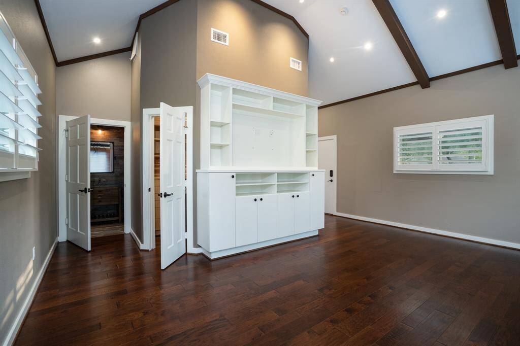You'll also enjoy the updated lighting, shutters and walk-in closet.