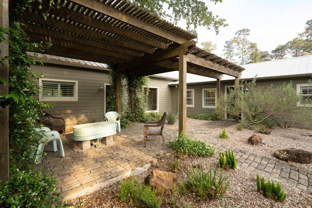 Charming paver patio with room for a grill extending the entertaining to outdoors.