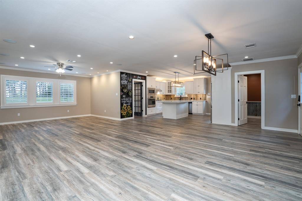 Welcome home to your open floor plan with recent luxury vinyl plank flooring.