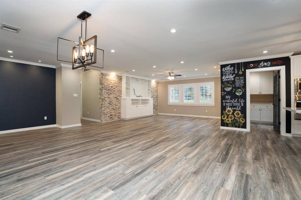 Living, dining and kitchen are all open to each other.