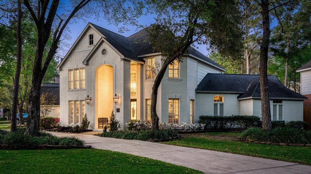 Gorgeous refreshed brick in Alabaster White stands out against an oversized corner lot with mature landscape. Newly added gas lanterns light the way and welcome all.