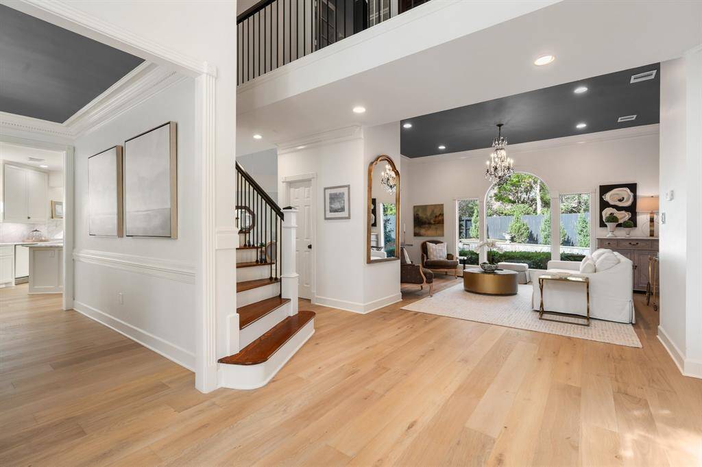 Stunning white oak flooring throughout compliments light Alabaster walls.