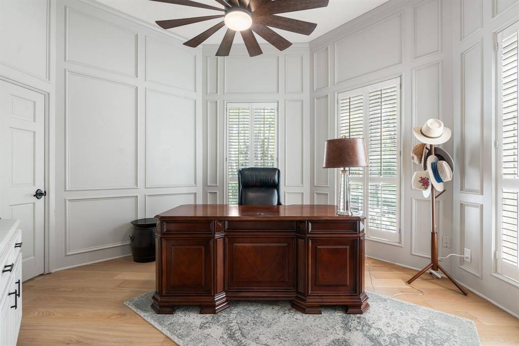 The study also features timeless paneled walls, plantation shutters and a remote Smart Fan.