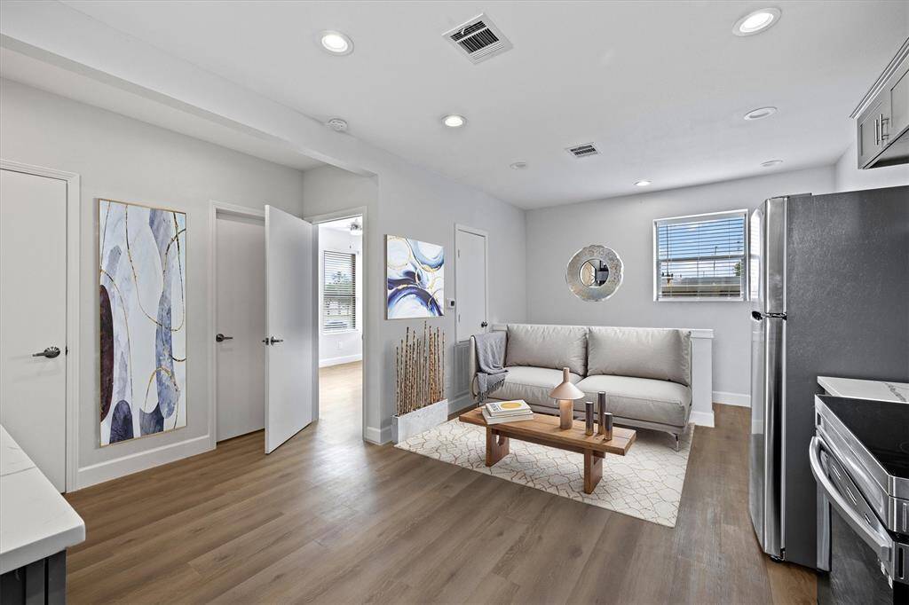 Virtually Staged Living area Upstairs in each unit