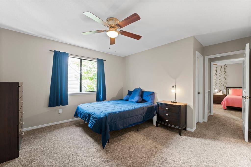Bedroom #4 has an adjacent bonus room offering flexible options for multi-family living, a quiet study, or a playroom