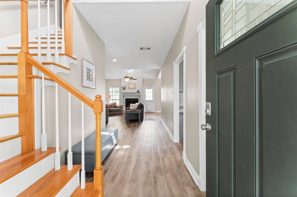 Clean lines, custom built-ins and large windows elevate the beauty of this home.