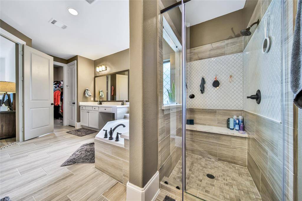 Oversized walk-in shower.