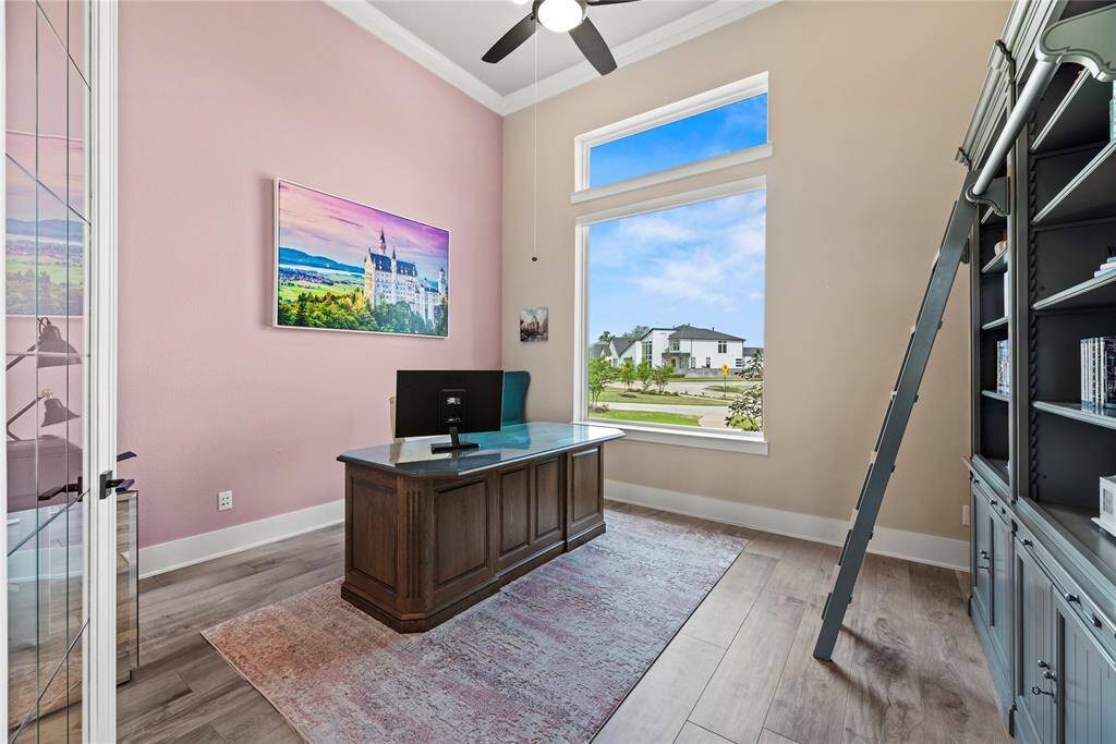 Sequestered with French doors, the home office may be utilized for telecommuting or running a successful online business. For those continuing their education, it may also serve as a distance learning area and study.