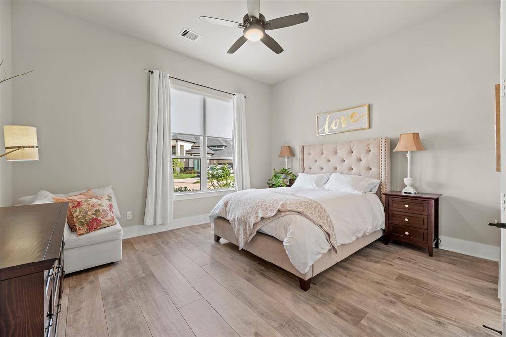 Spacious downstairs guest suite, offering comfort and privacy for visitors.