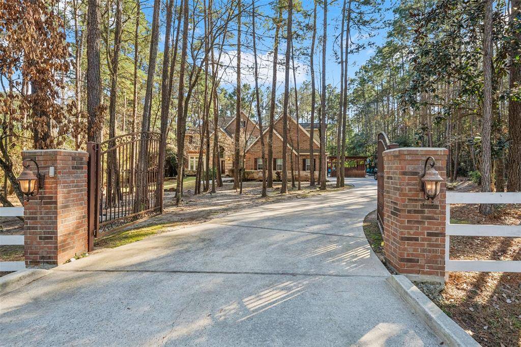Gated driveway to your serene retreat.