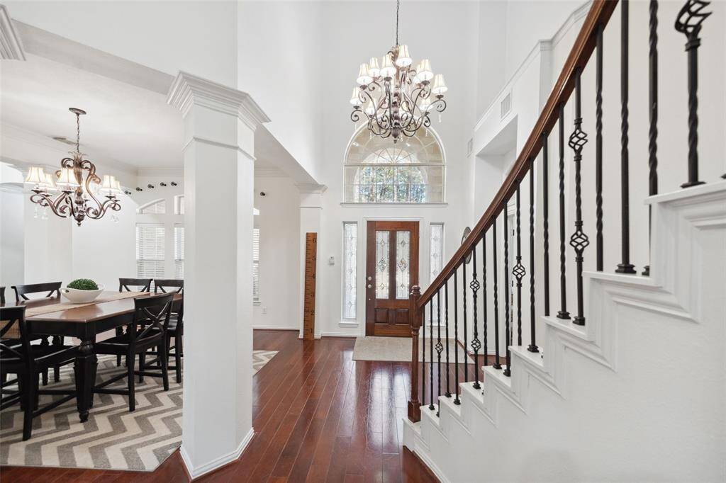 FOYER -Pretty entrance. And great things you don't see: Water filtration system plus 3 a/c's for the ultimate in efficiency with a whole house generator.