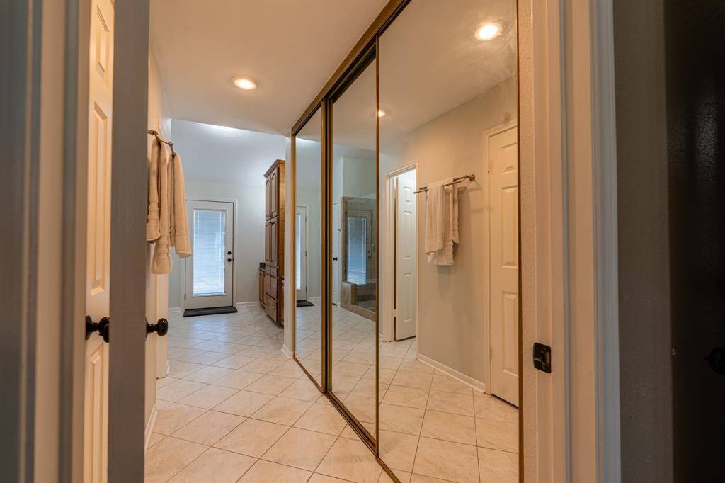 Master bath with outside private access to pool and hot tub