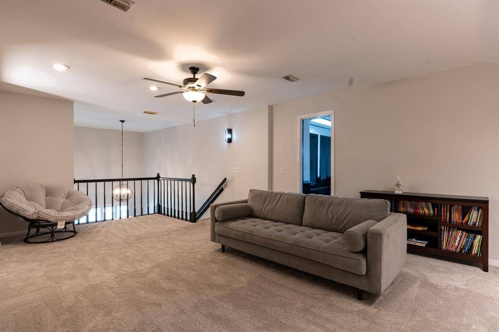 Game room/family room with built in cabinets