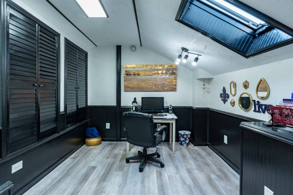 Study/Craft room with skylight