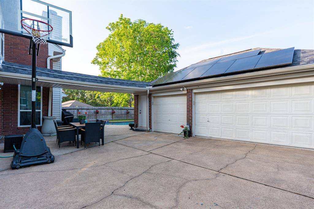 Large multi-car garage and driveway