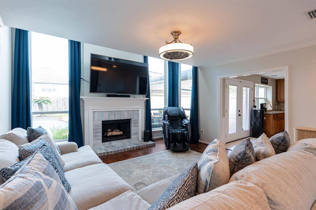 Downstairs living room/den with new gas log fireplace