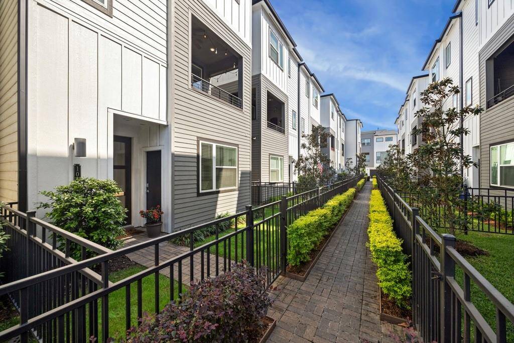 View of the fully gated front yard—an enviable feature for pet owners.