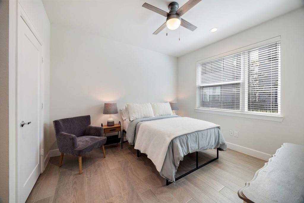 The first-floor suite also includes a mini refrigerator, microwave, sink, washer and dryer hookups, and a private en suite bath.