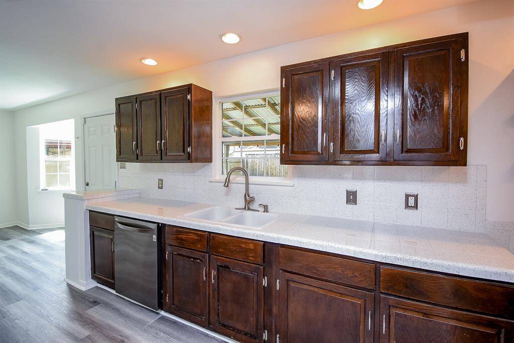 This kitchen has a fantastic layout and is very spacious.