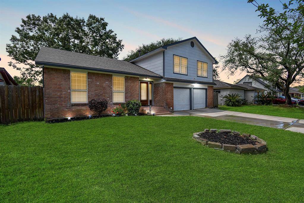 Charming curb appeal with well-maintained landscaping and a welcoming front porch!
