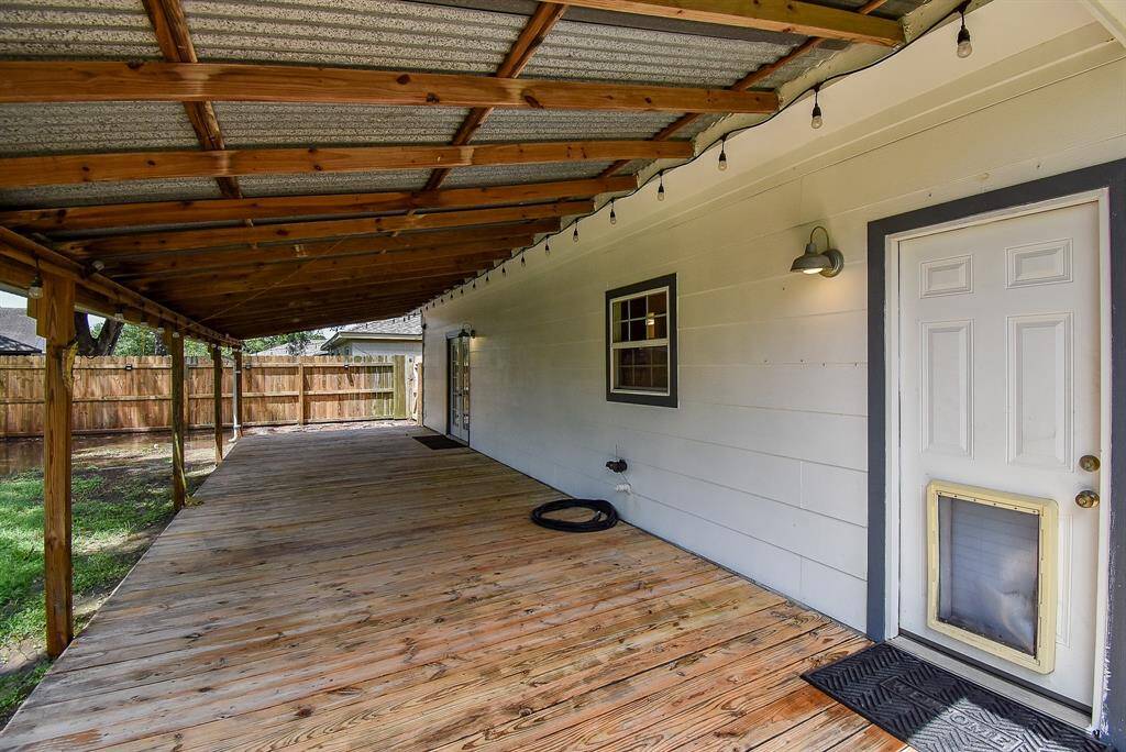 Get out from under the Texas sun, but still enjoy the great outdoors under this amazing covered patio!