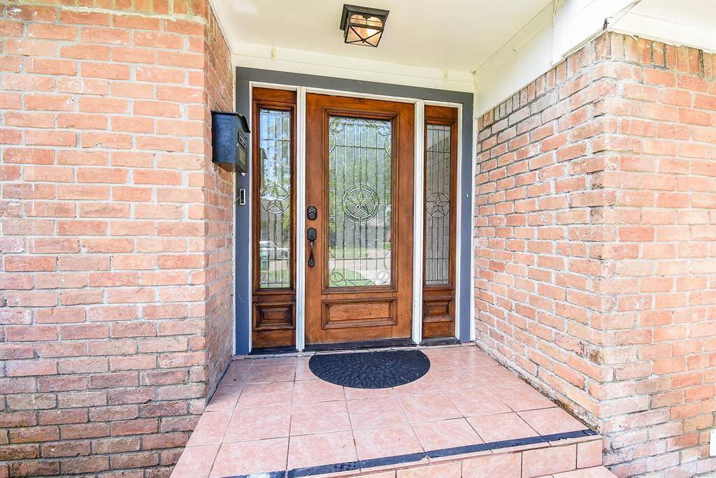 The beautiful front porch is the perfect welcome to your family, friends, and guests.