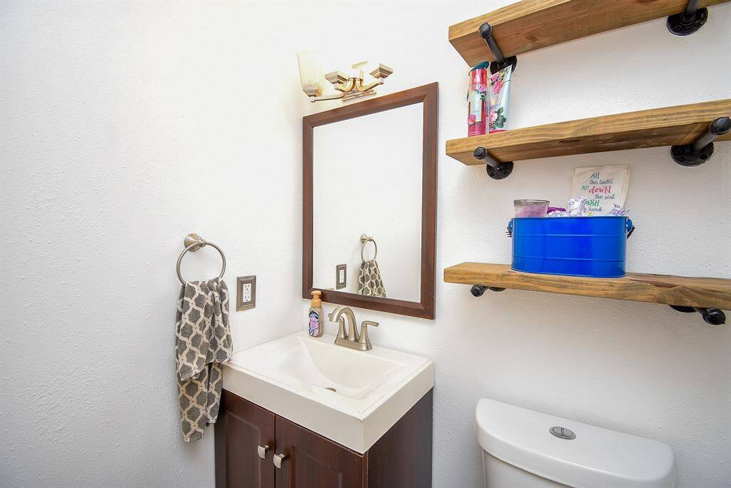 This well-appointed half bathroom is great for when you have family, friends, and guests over.