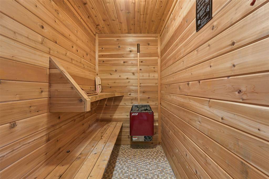 Peek inside the cedar-lined dry sauna and take note of the tile floors and dual bench seats. Such a great way to sweat out toxins and come out feeling refreshed!