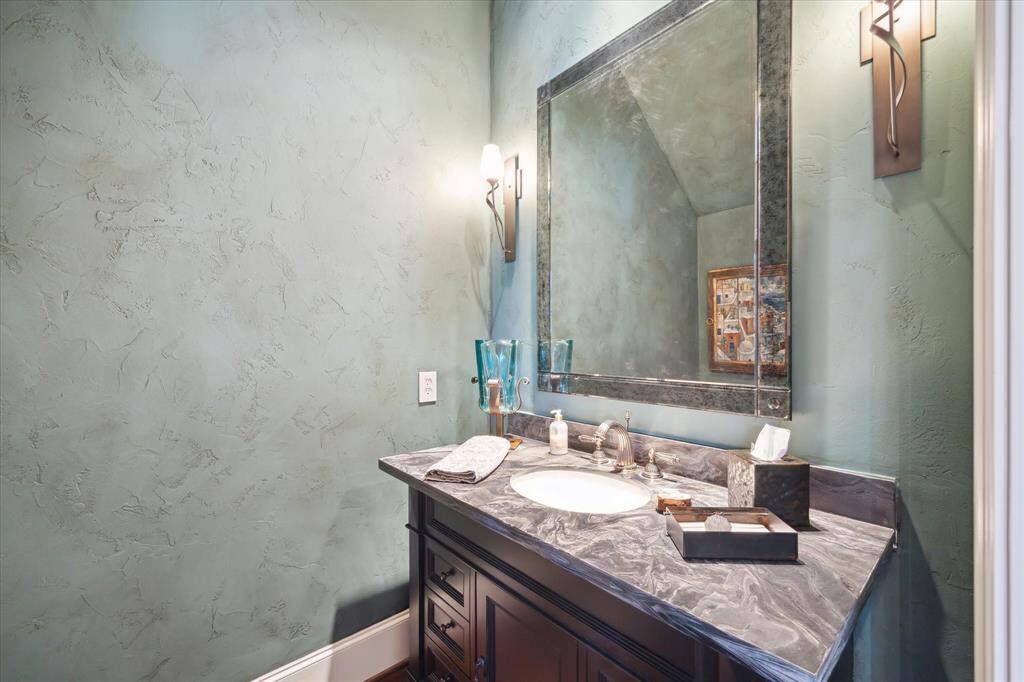 Elegant powder room with custom vanity!