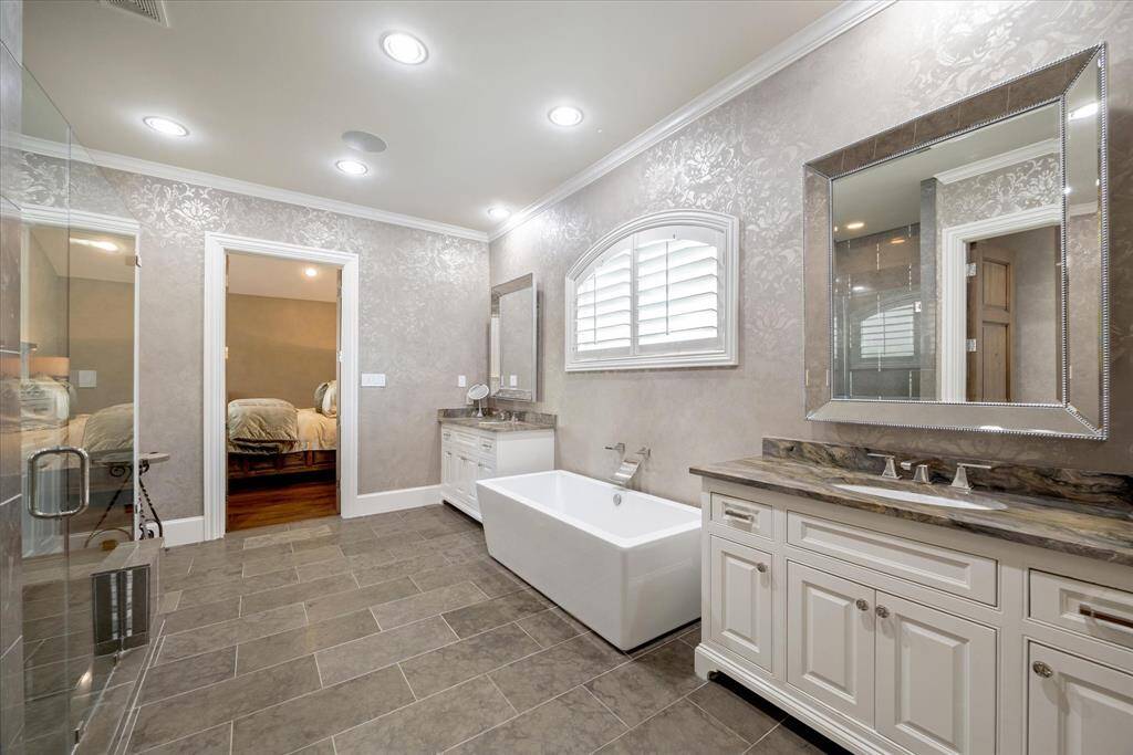 Sonos sound system continues into this spacious bath.