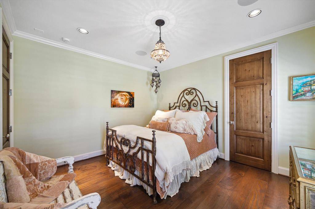 Large secondary bedroom with beautiful hardwoods and en suite bath and walk-in closet.  Sonos sound system in the secondary suites as well!