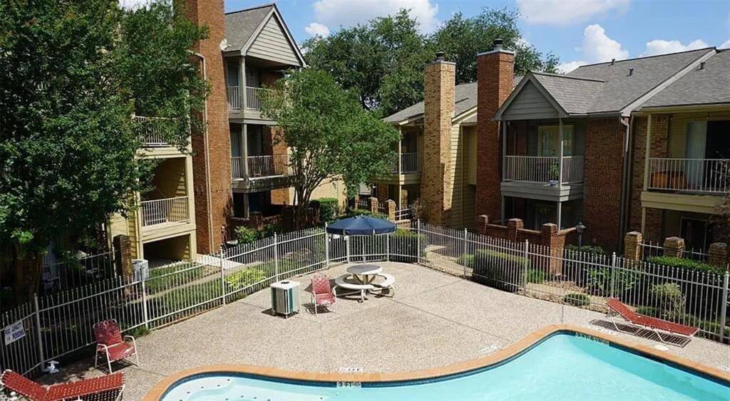 Enjoy serene poolside views from your new home, perfect for relaxation and entertaining.