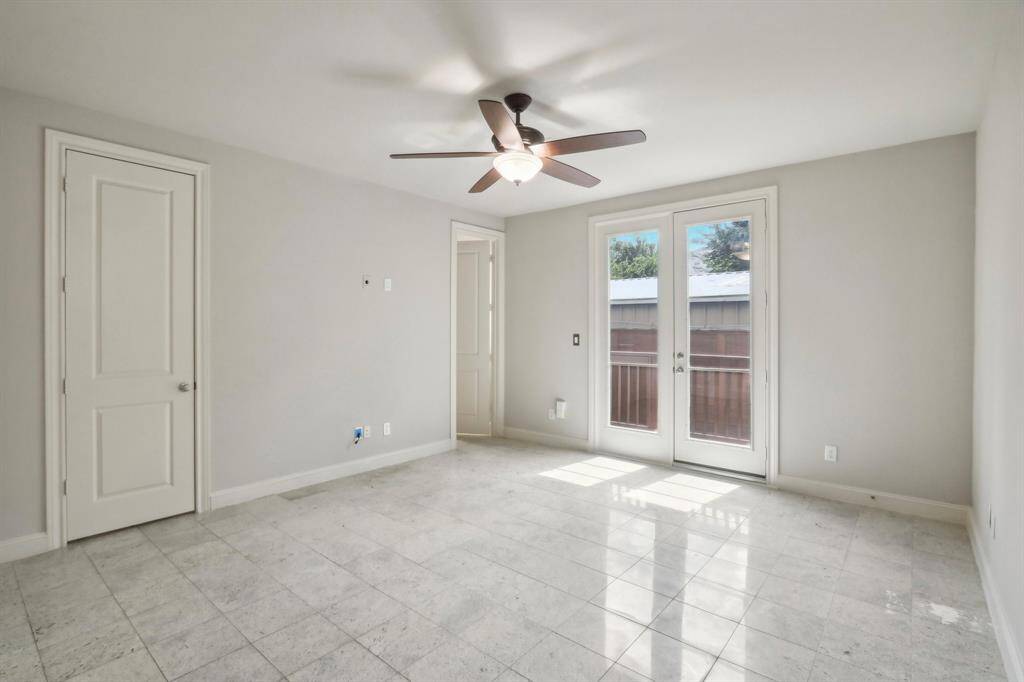 1st floor bedroom with en suite bathroom, granite floors and french doors leading to backyard with a deck and fully fenced. Big closet as well. Light and bright. Could also be used as a study