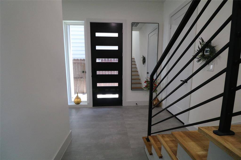 Modern railing and square edge WHITE OAK REAL HARDWOOD stairs and flooring upstairs