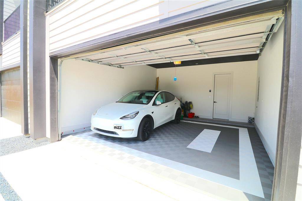 Garage Excellence: Extra-deep 21-ft garage fits a full-size truck or SUV with ease. Features include dual EV chargers, custom flooring with drainage, R16 insulated walls, smart WiFi lighting, and Amazon-compatible garage delivery.