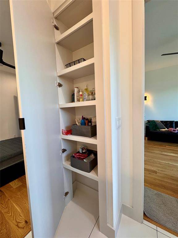 Secondary bathroom built in towel cabinet