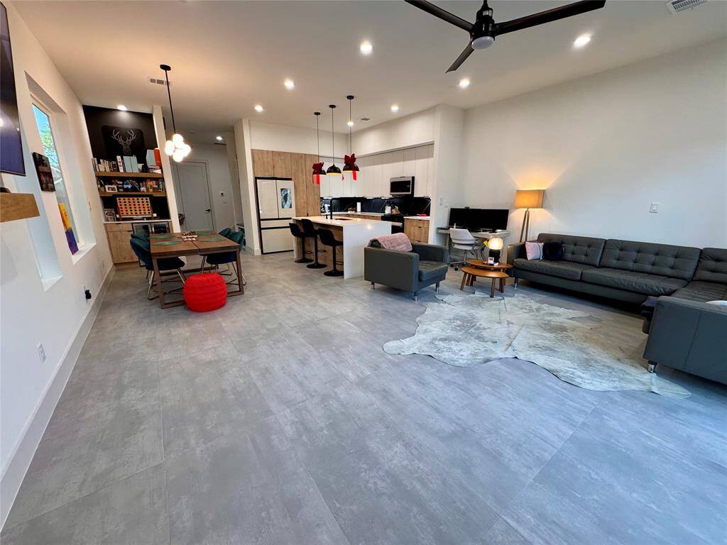 Natural Light Masterpiece: Oversized windows and patio doors from Elevate, a Velux skylight, and east-facing window in the primary shower bring natural light into every corner of the home.