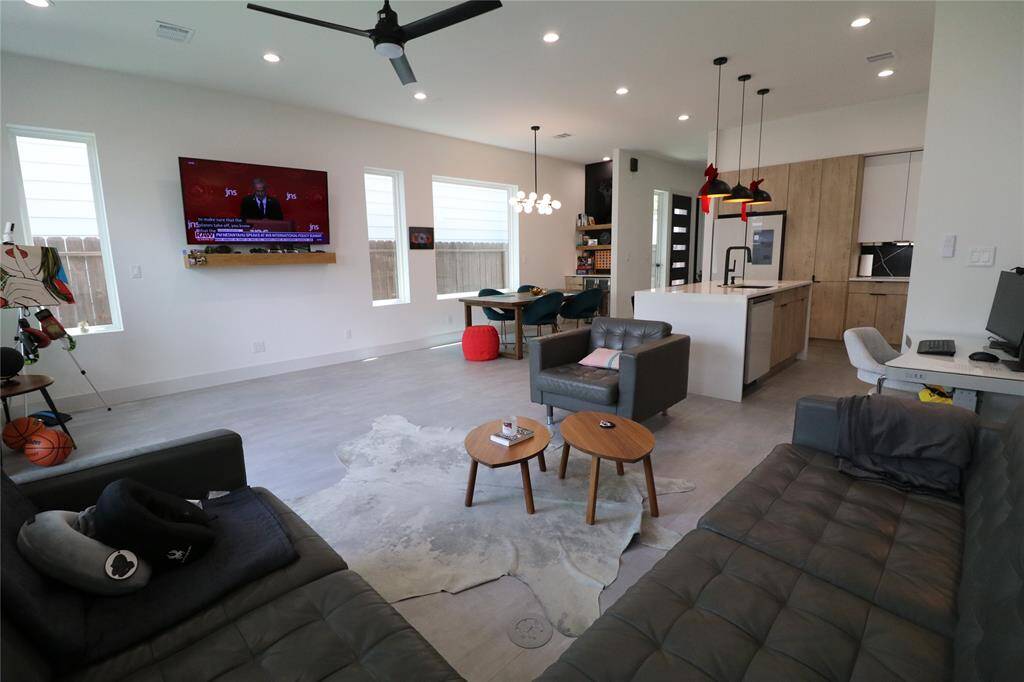 Natural Light Masterpiece: Oversized windows and patio doors from Elevate, a Velux skylight, and east-facing window in the primary shower bring natural light into every corner of the home.