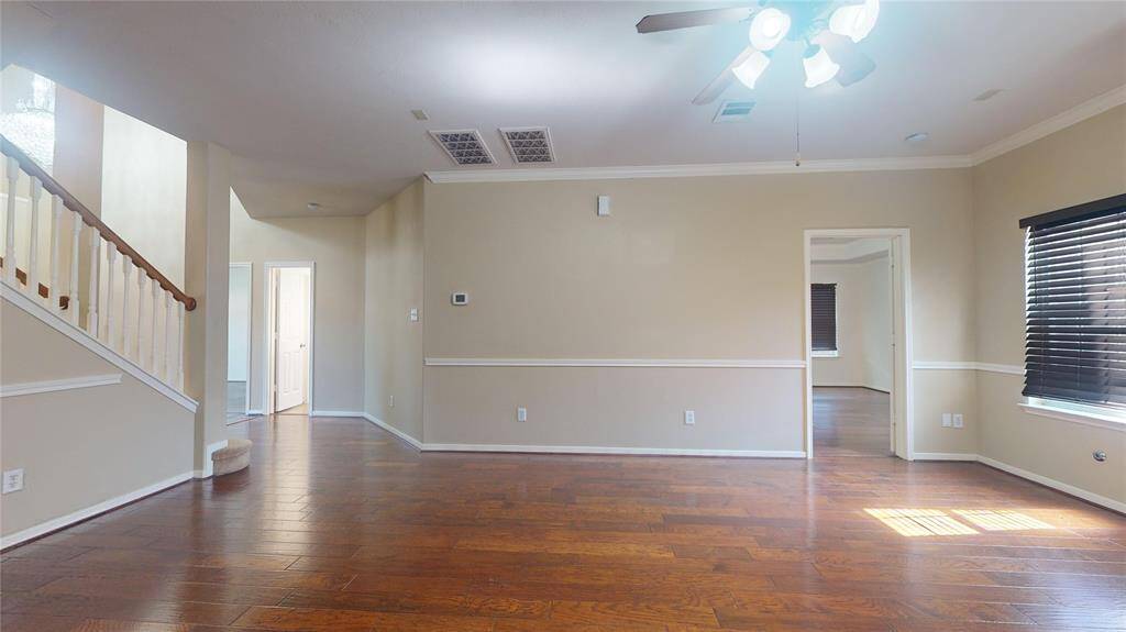 Enjoy seamless flow from the family room to the inviting primary bedroom.