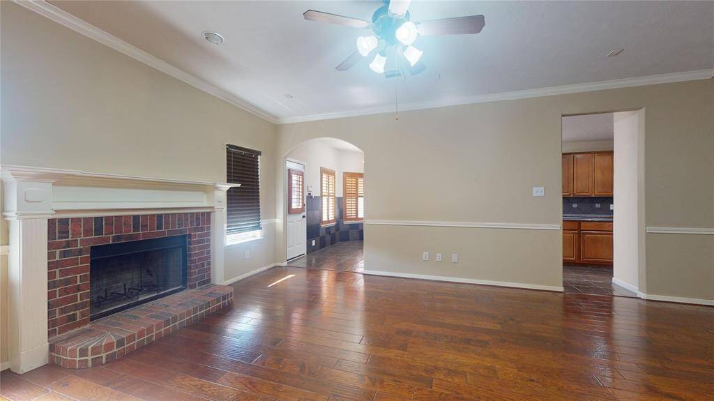 Cozy family room featuring a charming gas log fireplace.