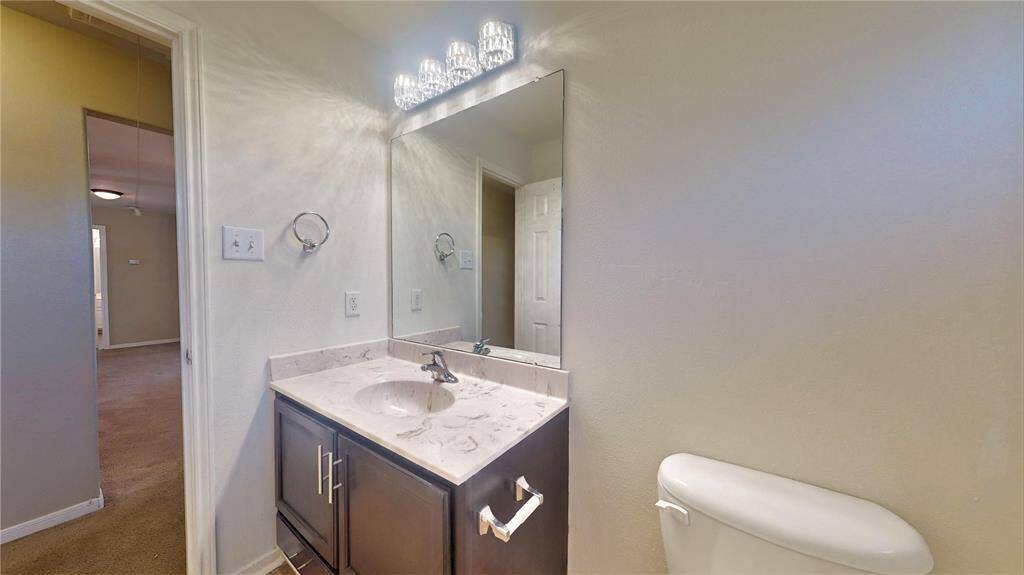 Stylish third guest bathroom upstairs with modern fixtures and elegant finishes.