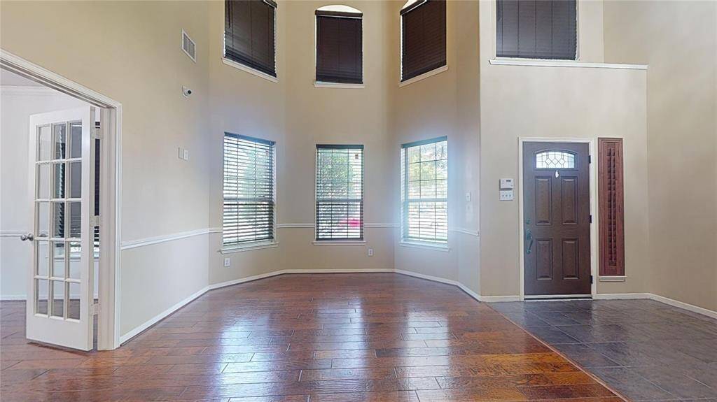 This home is bathed in natural light, thanks to its abundant windows.