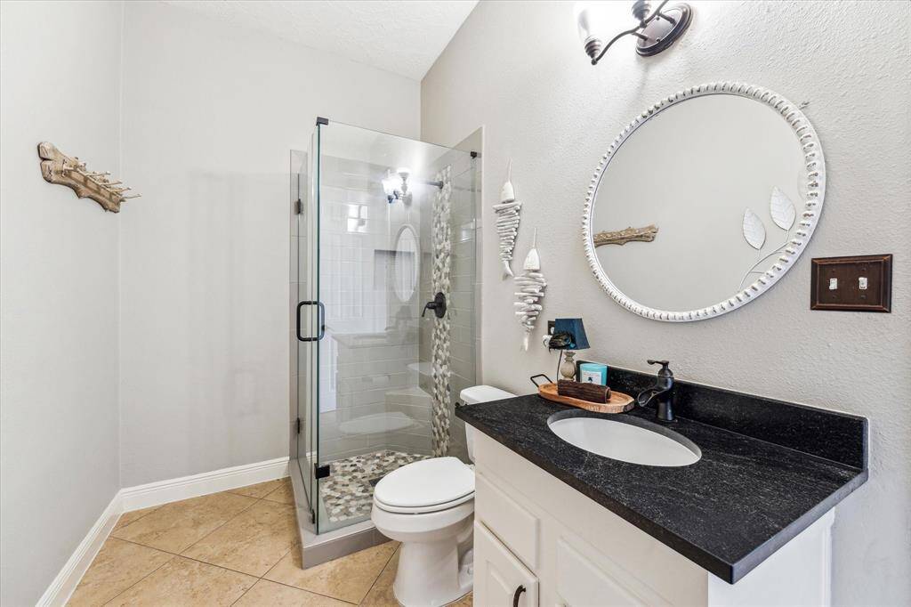 2nd full bath downstairs off of the flex room or 5th bedroom