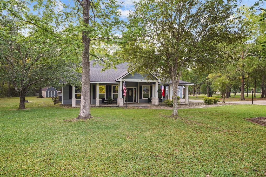 The huge wrap around front porch is very inviting!
