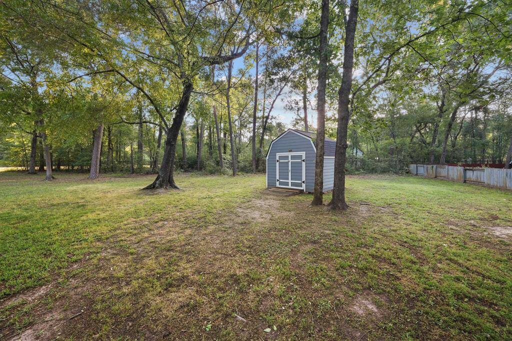View of the backyard where the storage shed is located
