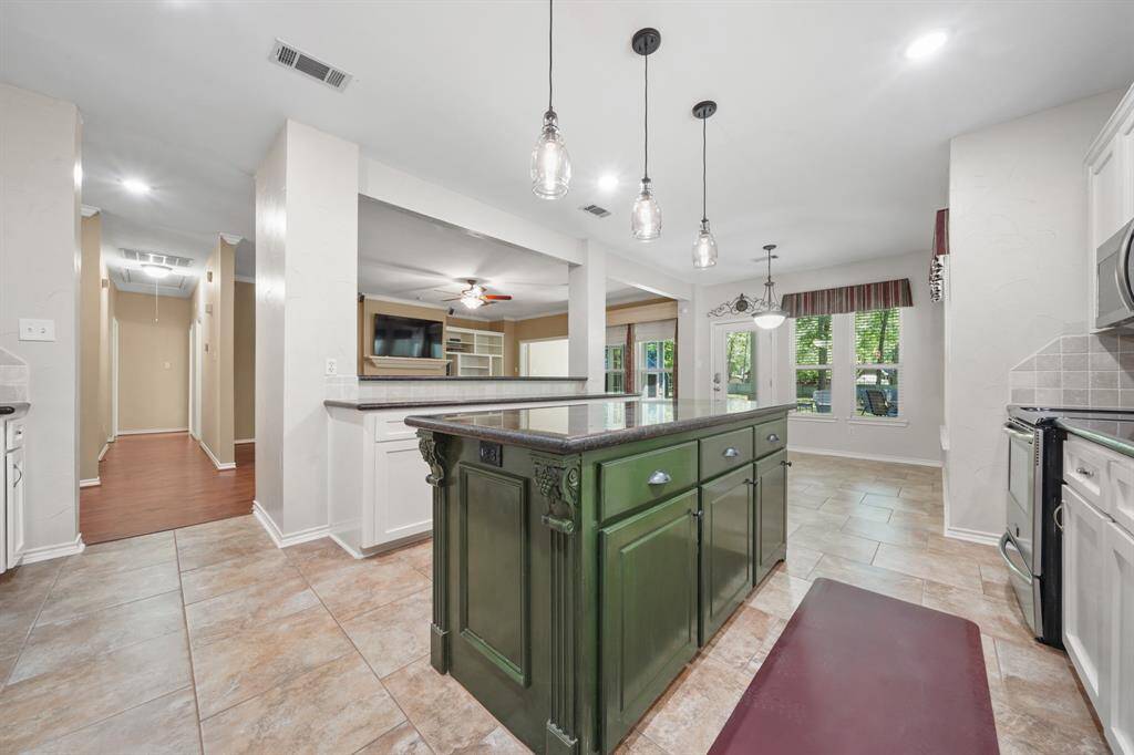 View of the kitchen looking toward the hallway