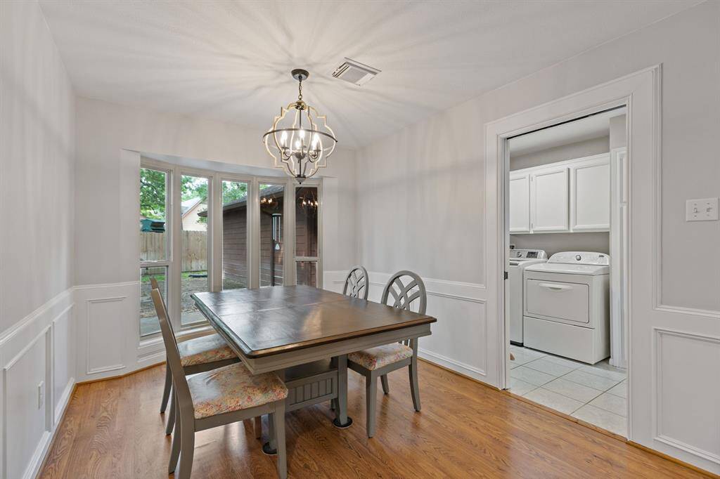 Breakfast room with updated lighting.