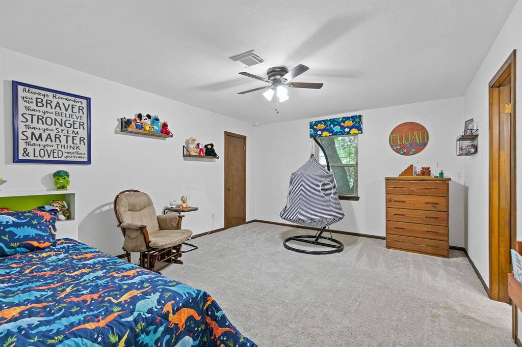 A secondary bedroom has private access to bathroom and large walk in closet.